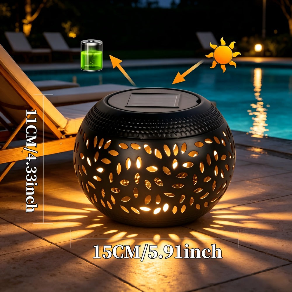 Lampe solaire boule ajourée à poser, noire ou blanche